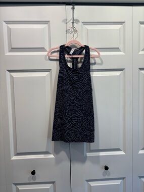 Athleta Racerback tank Black and blue patterned.